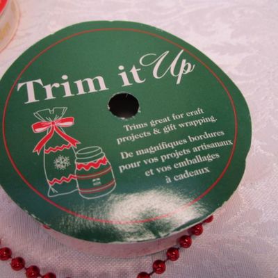 Sale Photo Thumbnail #442: 12' of red bead trim, 5 yds gold ribbon, 80", 2.22 yds Happy Holidays ribbon, 6 yds. White ribbon, 3 yd 1/4" elastic, See pictures