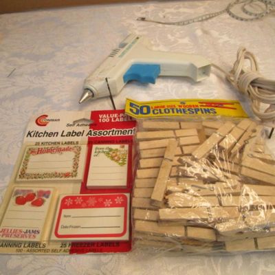 Sale Photo Thumbnail #476: New package of 50 3" clothes pins, 1 new package kitchen label assortment (100 lables), 1 hot glue gun