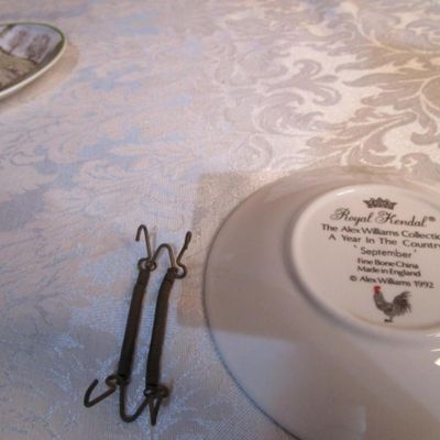 Sale Photo Thumbnail #772: Incudes plate hanger, 5" in diameterSee pictures
