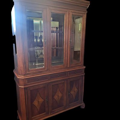 Sale Photo Thumbnail #23: 6) 82"T × 54"W × 19"D 3 glass upper display doors  3 middle pull-out drawers  3 lower cabinet doors featuring diamond sunburst wood marquetry  curved bun feet. Dimensions: 82" H x 54" W x 19" D  