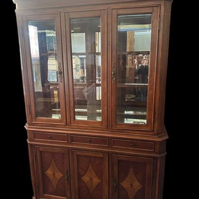 Sale Photo Thumbnail #18: 6) 82"T × 54"W × 19"D 3 glass upper display doors  3 middle pull-out drawers  3 lower cabinet doors featuring diamond sunburst wood marquetry  curved bun feet. Dimensions: 82" H x 54" W x 19" D  