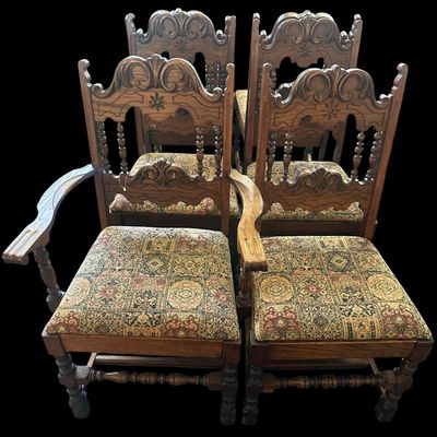 Sale Photo Thumbnail #157: Set of 6 heavy solid oak dining armchairs featuring high carved crown backrests with flower medallion rosettes  turned spindle gallery  curved armrests  stretchered legs  and tapestry woven patterned upholstery.  