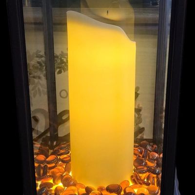 Sale Photo Thumbnail #361: Duraflame 28-inch heavy-duty infrared quartz electric lantern heater (Model AZ-82040 / 10ILH117 series) in a bronze finish. Features a 1400W/1500W infrared heating element (heats up to 1,000 sq ft), flickering LED pillar candle over amber glass rocks, tou