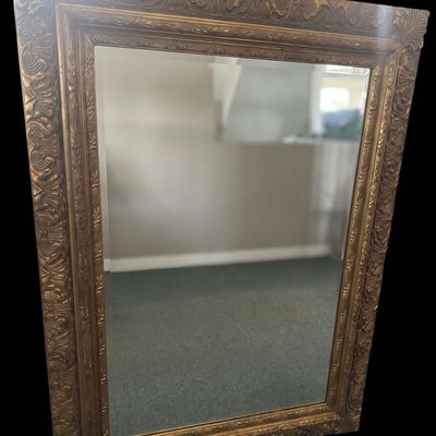Sale Photo Thumbnail #366: Substantial rectangular vanity/accent mirror featuring a deep ornate carved metallic gold frame with filigree scroll embossing. Items may be held with pre-payment or a deposit. We are not scammers  you can check our track record  and we are verified. We c