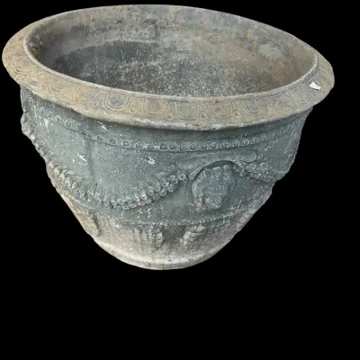 Sale Photo Thumbnail #380: Substantial round cast concrete garden planter featuring deeply relief-carved acanthus scroll motifs and smooth thick rim with naturally weathered finish.  
