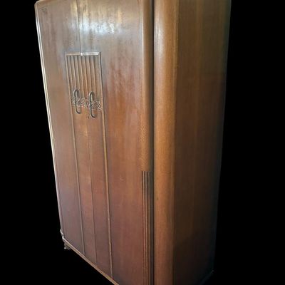 Sale Photo Thumbnail #458: Substantial antique solid wood armoire featuring double doors and spacious interior storage.75" X 49" X 22"  