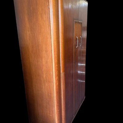Sale Photo Thumbnail #459: Substantial antique solid wood armoire featuring double doors and spacious interior storage.75" X 49" X 22"  