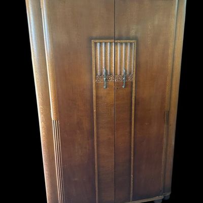 Sale Photo Thumbnail #456: Substantial antique solid wood armoire featuring double doors and spacious interior storage.75" X 49" X 22"  