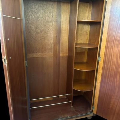 Sale Photo Thumbnail #457: Substantial antique solid wood armoire featuring double doors and spacious interior storage.75" X 49" X 22"  