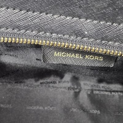 Sale Photo Thumbnail #573:  Michael Kors Selma  black and gold. NWT / display.                      