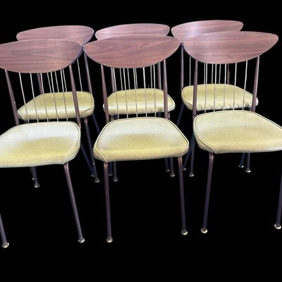 Sale Photo Thumbnail #584: 29.50 Tall 70.50 Long (w/leaves) 46.00 (w/o leaves) 35.50 Wide 11.50 (each leaf) MCM dining set featuring walnut-tone laminate rectangular table with extension leaf and tapered black metal legs with brass ferrule feet  paired with 6 matching chairs featur