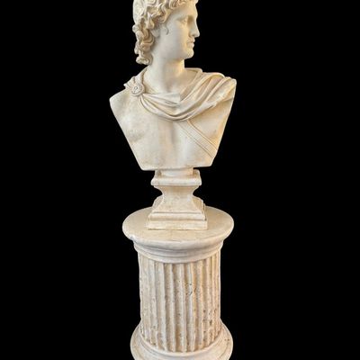 Sale Photo Thumbnail #601: 40.00 Tall 16.00 Base 24.00 Bust Classical Apollo Belvedere Bust Statue on Fluted Column Pedestal  cast stone/resin classical sculpture of Apollo Belvedere in toga  mounted on matching heavy fluted Grecian column pedestal stand with distressed antique fin