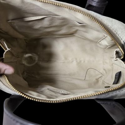 Sale Photo Thumbnail #697:  Fossil Gold and Brown Purse.                           