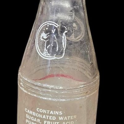 Sale Photo Thumbnail #794:  Dr. Nut 7 oz New Orleans regional soda bottle. Label damaged.                           