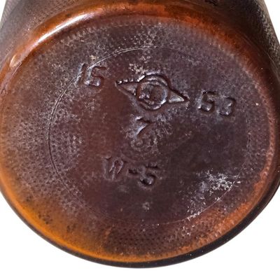 Sale Photo Thumbnail #825:  Purex amber bleach bottle. Owens-Illinois base 15 I 53 — 1953.                           
