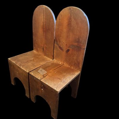 Sale Photo Thumbnail #897: 29"T × 11"W  12" seat Pair of Primitive sturdy rustic solid pine/hardwood children's chairs featuring arched tombstone-style backrests  solid seats  and cutout arch apron bases. Dimensions: 29" Tall x 11" Wide (12" Seat-to-Floor Height).  