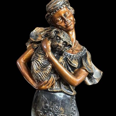 Sale Photo Thumbnail #965:  14.75-Inch Art Nouveau Woman Holding Dog Figurine.                           