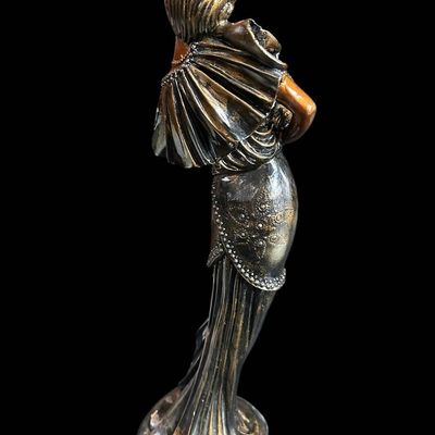 Sale Photo Thumbnail #967:  14.75-Inch Art Nouveau Woman Holding Dog Figurine.                           