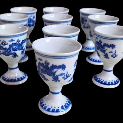Sale Photo Thumbnail #1183:  10 Blue and White Porcelain Egg Coddlers with Dragon Motif.                           