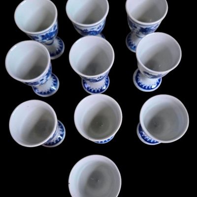 Sale Photo Thumbnail #1184:  10 Blue and White Porcelain Egg Coddlers with Dragon Motif.                           