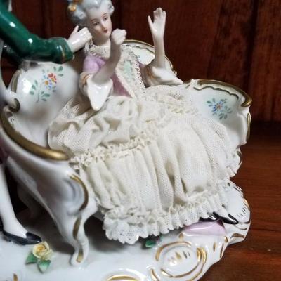 Lot-129 Porcelain Lace Figurine (Man in Green & Lady)