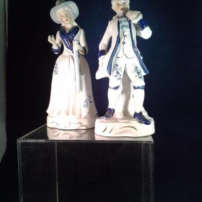 Lot 17A. A pairof porcelain figurines