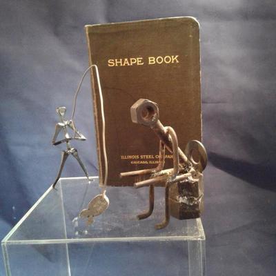 Lot 29c. Thinking man and fishing for shapes