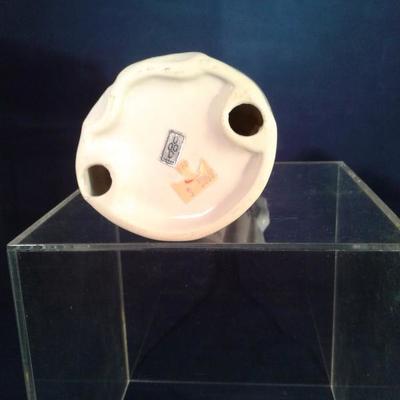 Lot 17A. A pairof porcelain figurines