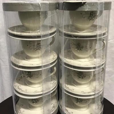 Set 8 / tea cups saucers nip 