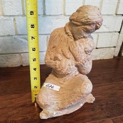 Nurturing Mother Holding Baby Clay Sculpture