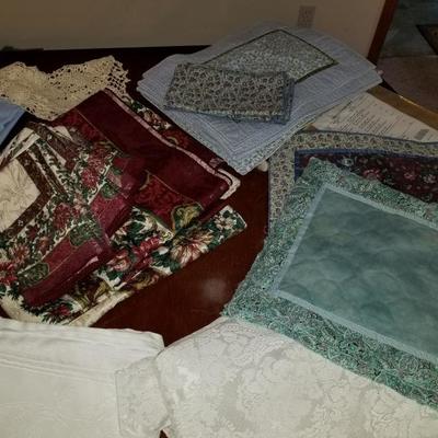 Collection of vintage table clothes and napkin sets