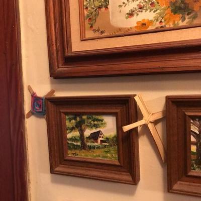 Framed Painted Artworks and table