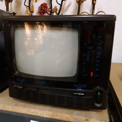 Vintage mini T.V. portable with AM/FM "Action"