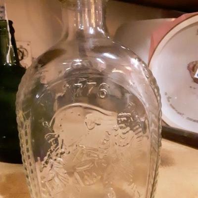 Log cabin syrup bottle