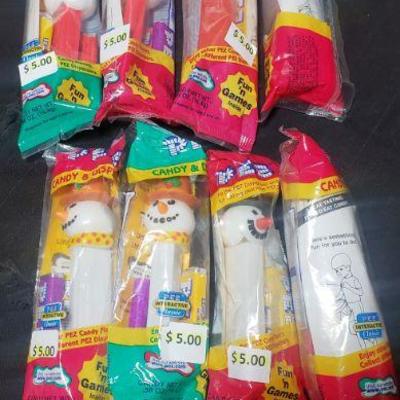 8 Pez Collectibles 4 Santa and 4 Snowmen