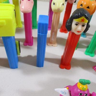 Large Lot of Pez  and rubber Flintstones Chracters 