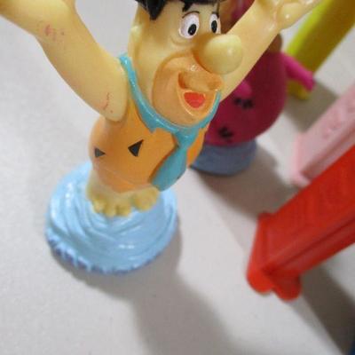 Large Lot of Pez  and rubber Flintstones Chracters 