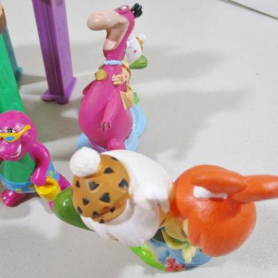 Large Lot of Pez  and rubber Flintstones Chracters 