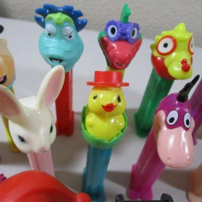 Large Lot of Pez  and rubber Flintstones Chracters 