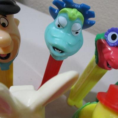 Large Lot of Pez  and rubber Flintstones Chracters 
