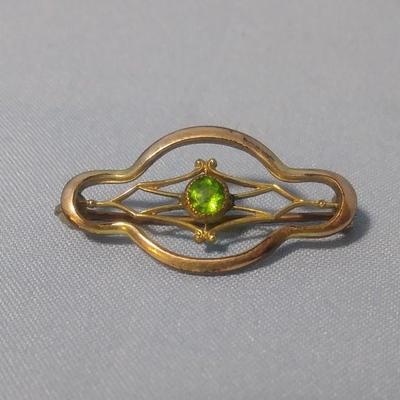 Vintage Gold Colored Brooch with Green Center Stone 1"L x 1/2"W