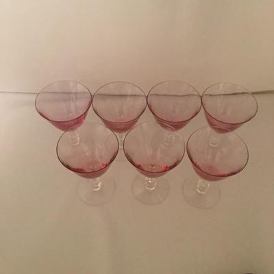 Lot 44 - Pink Stemware & Plates