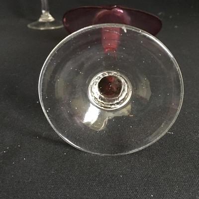 Lot 44 - Pink Stemware & Plates