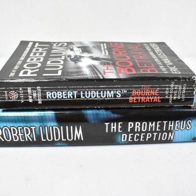 2 Books by Robert Ludlum: The Bourne Betrayal & The Prometheus Deception