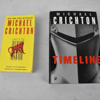 2 Books by Michael Crichton: Next (Paperback) and Timeline (Hardcover)