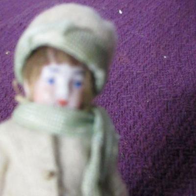 Lot 145 - 3 1/4" Hertwig Child Doll In Green Outfit