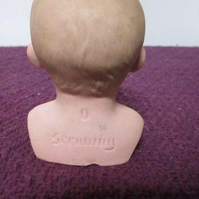 Lot 146 - Doll Heads