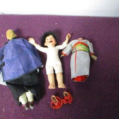 Lot 148 - Asian Style Dolls