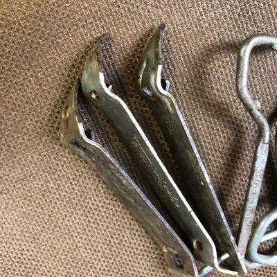 Lot #11  Ring with antique can and bottle Openers