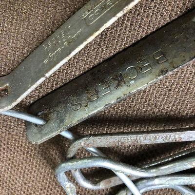 Lot #11  Ring with antique can and bottle Openers